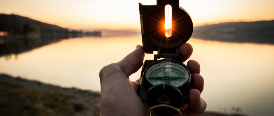 Person holding compass