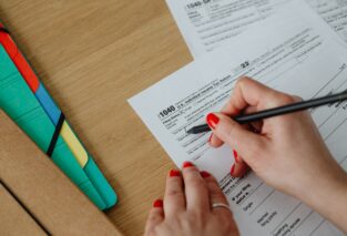 Lady filling out tax form